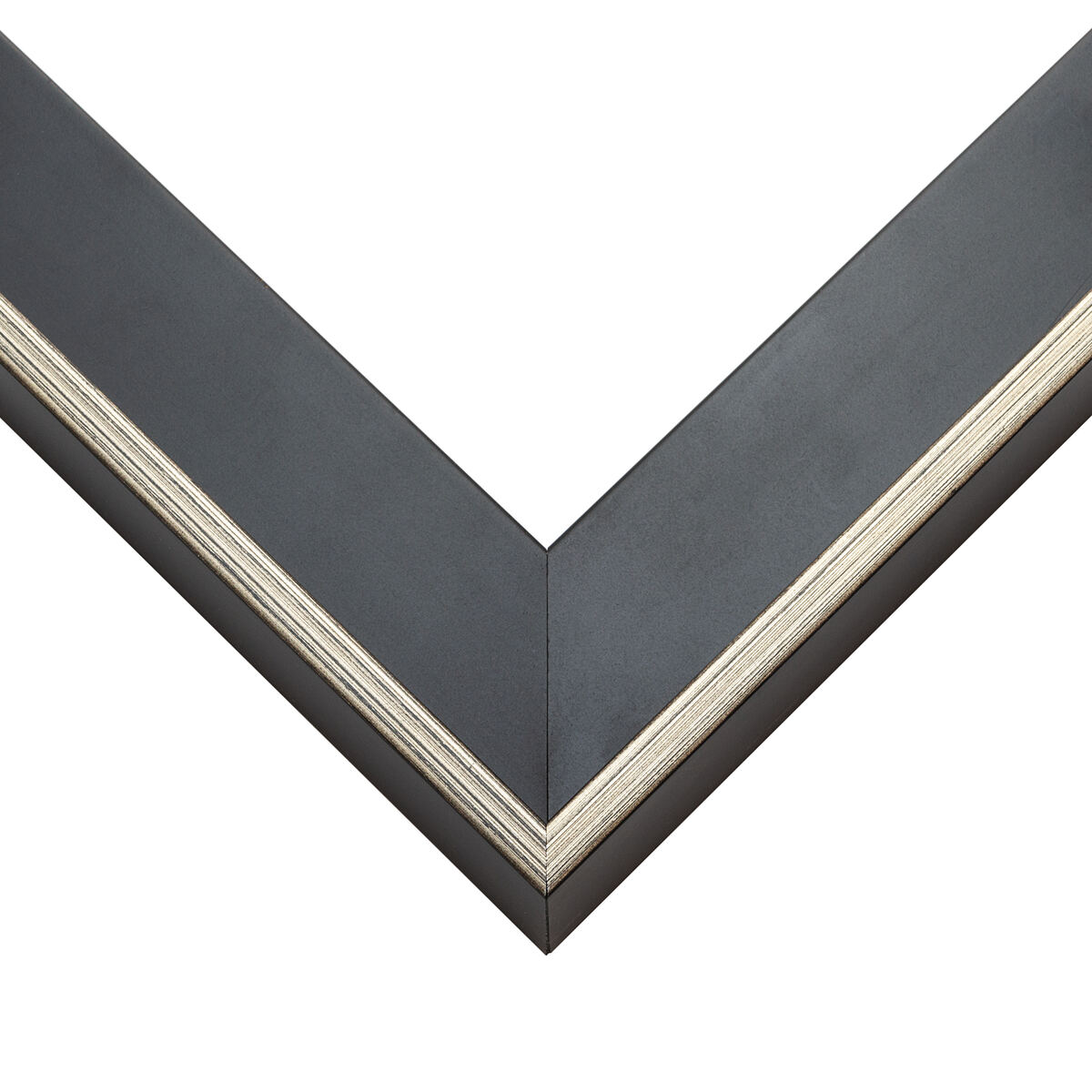 Black canvas float frame corner with a cool brushed silver reveal edge showing the float gap