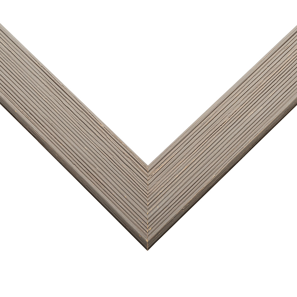 Gray picture frame moulding shown at the miter join