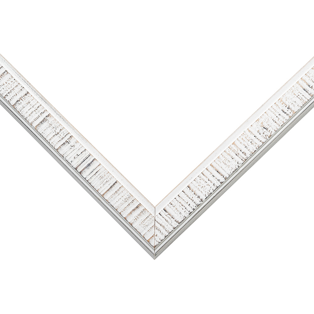 Modern White picture frame moulding shown at the miter join