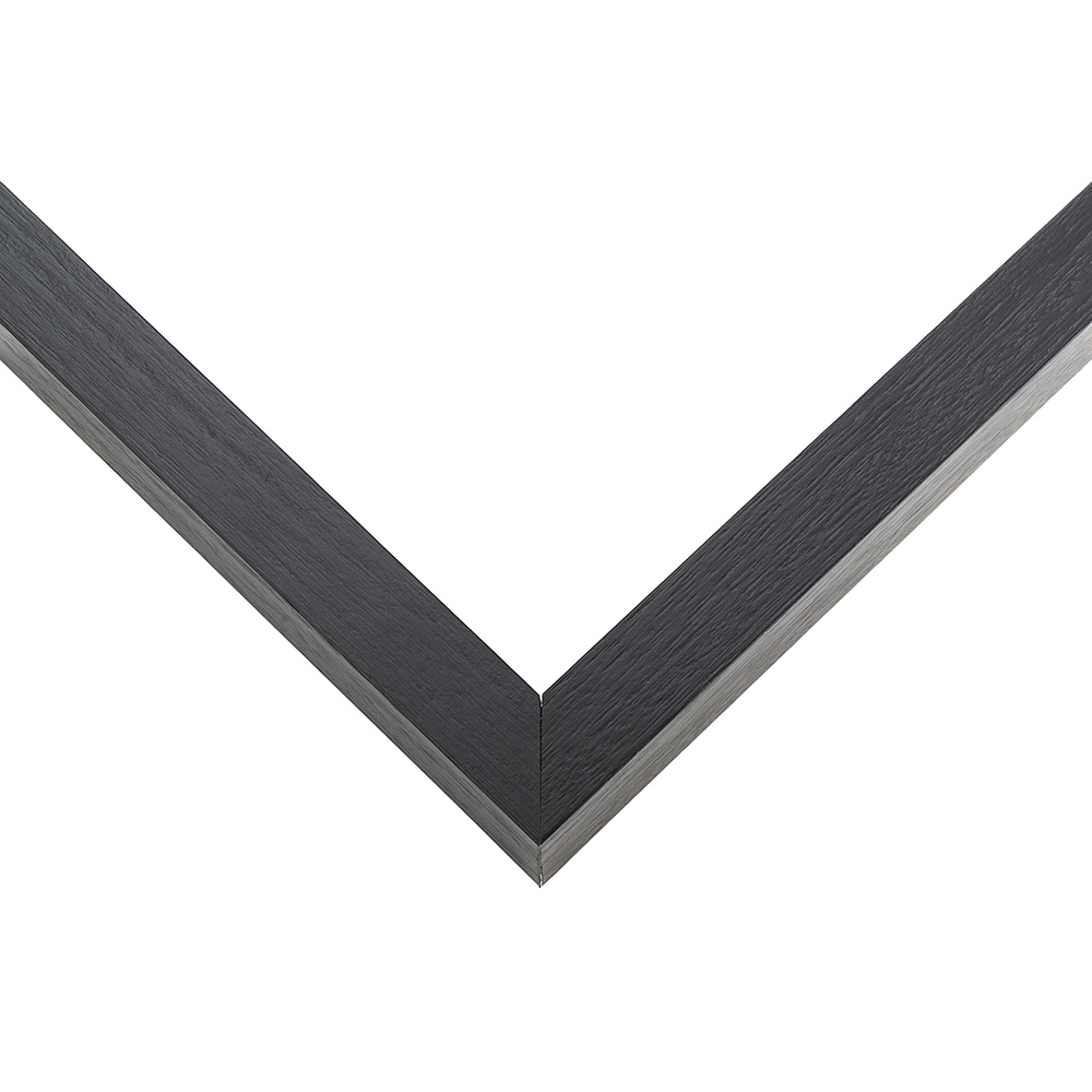 Slim Matte Black Shadow Box frame moulding shown at the miter join