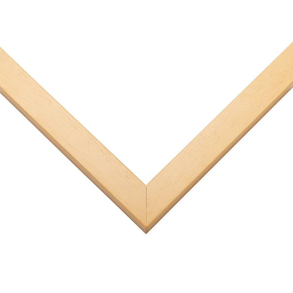 Natural Wood picture frame moulding shown at the miter join