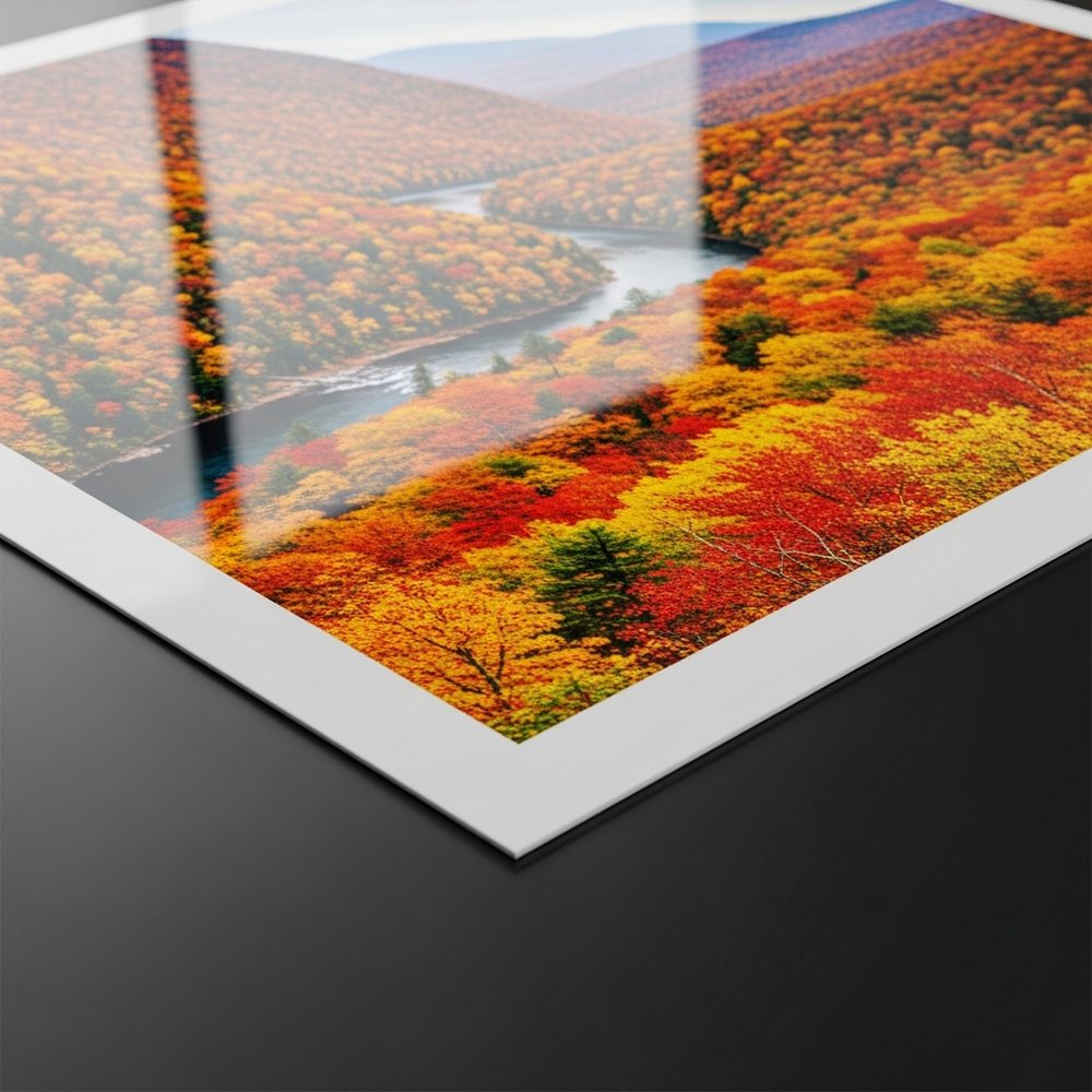 Corner of a satin luster print on a dark background, a vivid autumn river valley with a soft glossy sheen